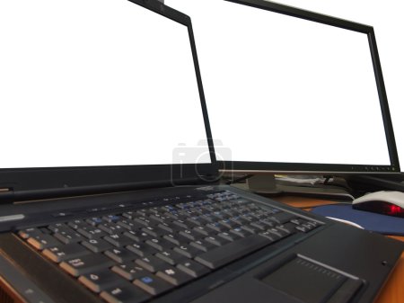 Laptop and big wide screen closeup
