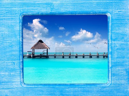 Blue wood frame with Caribbean beach