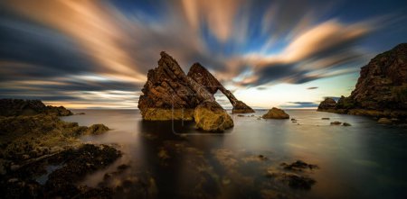 Panorama of Bow Fiddle Rock formations in dusk, Portknockie, Scotland