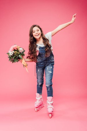 cheerful child in rollerblades with flower bouquet on pink background