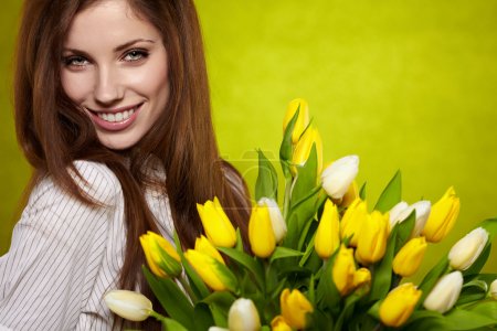 Woman with colorful tulip bouquet