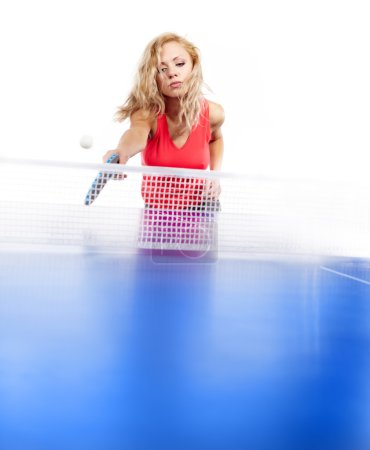 Sexy blonde with blue ping pong racke tplaying