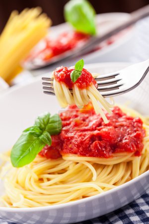 Spaghetti with Tomato Sauce on classical home table