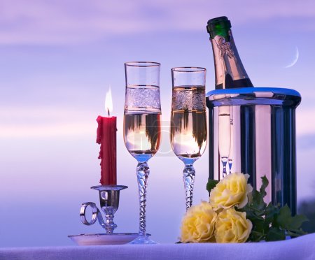 Art happy romantic dinner with wine on the sky background