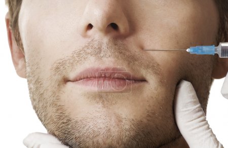 Man gets cosmetic injection of botox .Beauty Treatment
