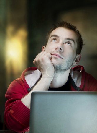 Man With Laptop Thinking