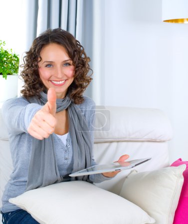 Young Woman With Touchpad At Home.Computer.