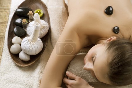 Spa Woman. Hot Stones Massage