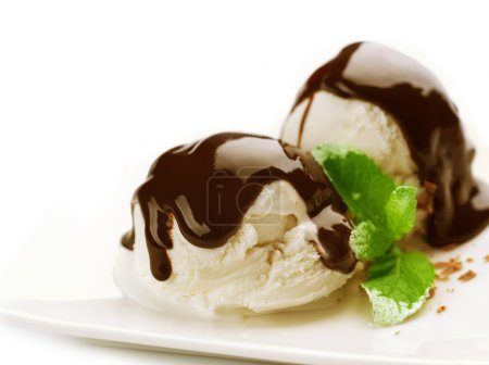 Ice cream with Chocolate topping. Dessert over white