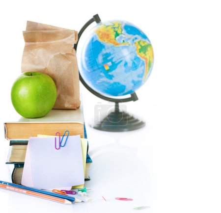 Back To School Concept. School Books And Green Apple Isolated On