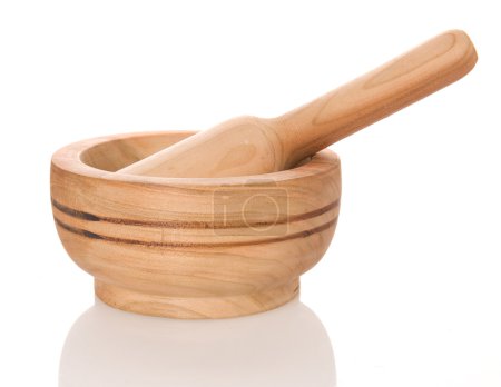 Wooden Mortar With Pestle Over White