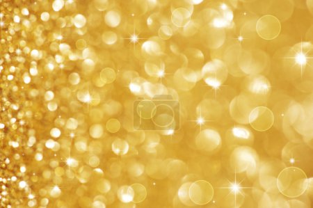 Christmas Golden Glittering background.Holiday Gold abstract tex