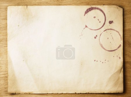 Old Paper Sheet Over Wooden Background