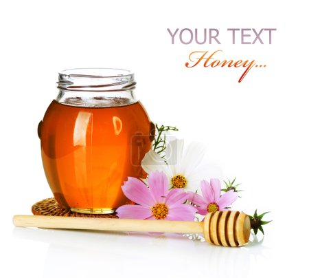 Honey jar over white