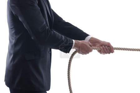 Business man with rope isolated on white background
