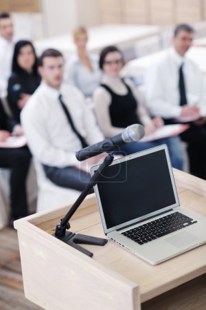 Laptop on conference speech podium