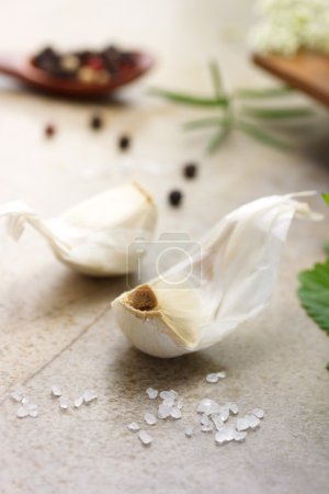 Garlic cloves with herbs