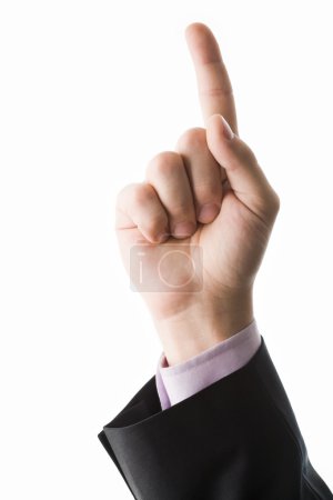Photo of human hand with forefinger pointing upwards