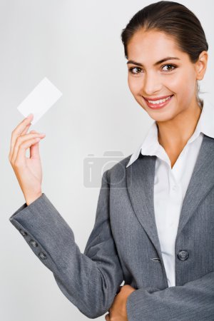 Woman holding a card