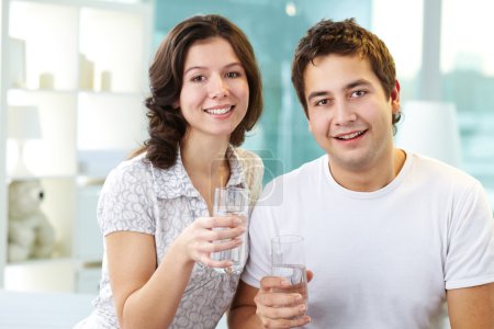 Couple drinking water