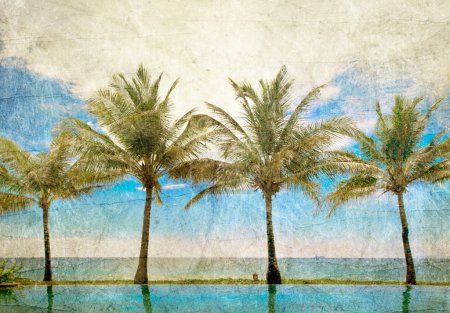 Reflections of palms in the pool