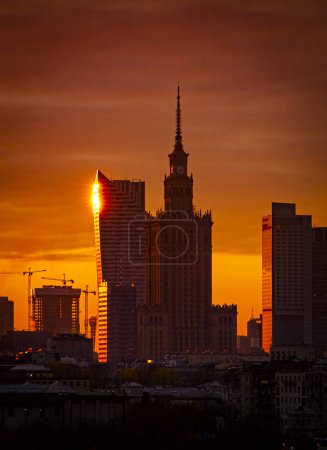 beautiful orange sunset in Warsaw, Poland. Aerial view of the city 