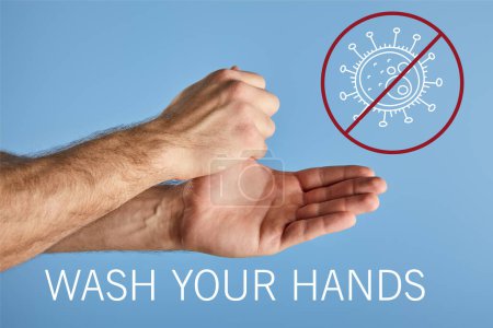 partial view of man washing hands isolated on blue, wash your hands illustration