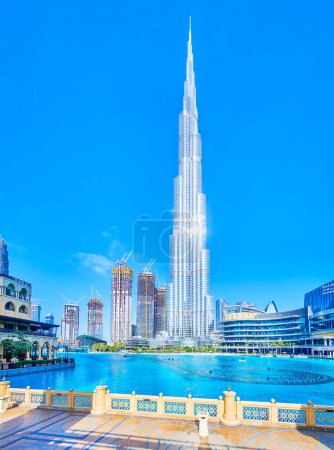 DUBAI, UAE - MARCH 3, 2020: The gorgeous Burj Khalifa skyscraper with sun flows on its surface is the highest and the most outstanding building in the world, on March 3 in Dubai