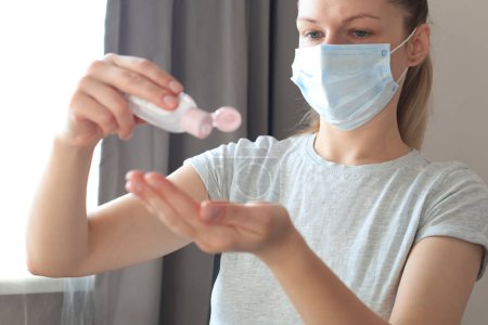 Woman using sanitizer hand gel. Hand hygiene coronavirus protection