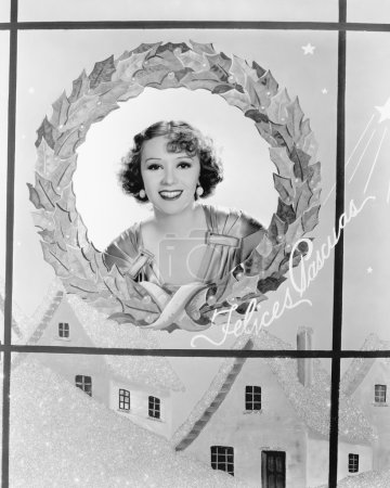 Image of a woman in a holiday wreath