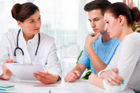 Doctor consults a young couple