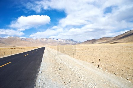 Yellowish mountain road view in tibet of China