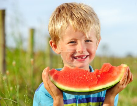 Happy boy with watermelon