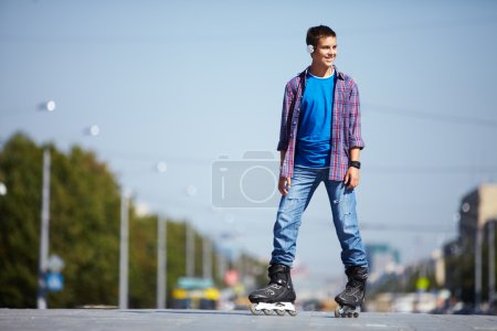 Lad on roller skates