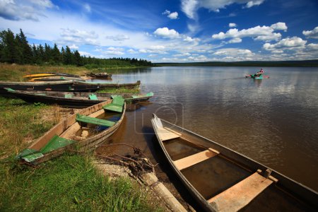 Boats by lake