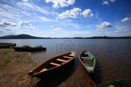 Boats near lake