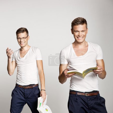 Two attractive guys holding a book