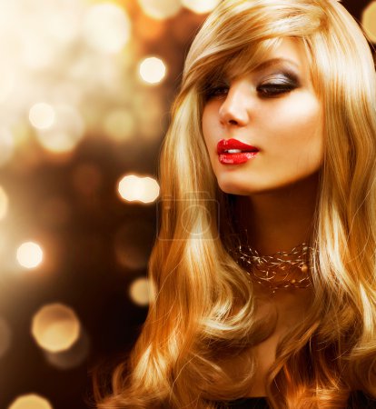 Blond Fashion Girl. Blonde Hair. Golden background