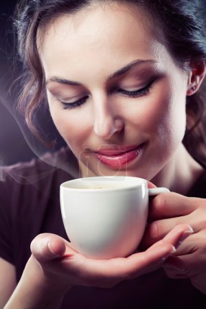 Beauty Girl With Cup of Coffee or Tea