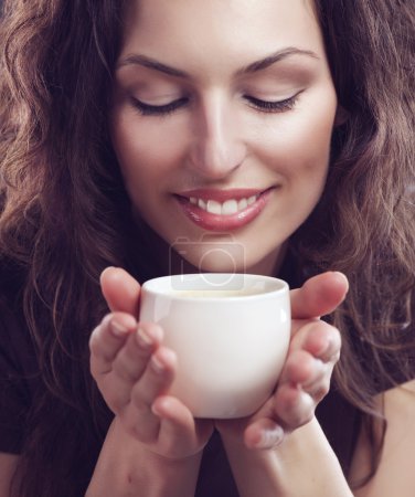 Beauty Woman With Cup of Coffee or Tea
